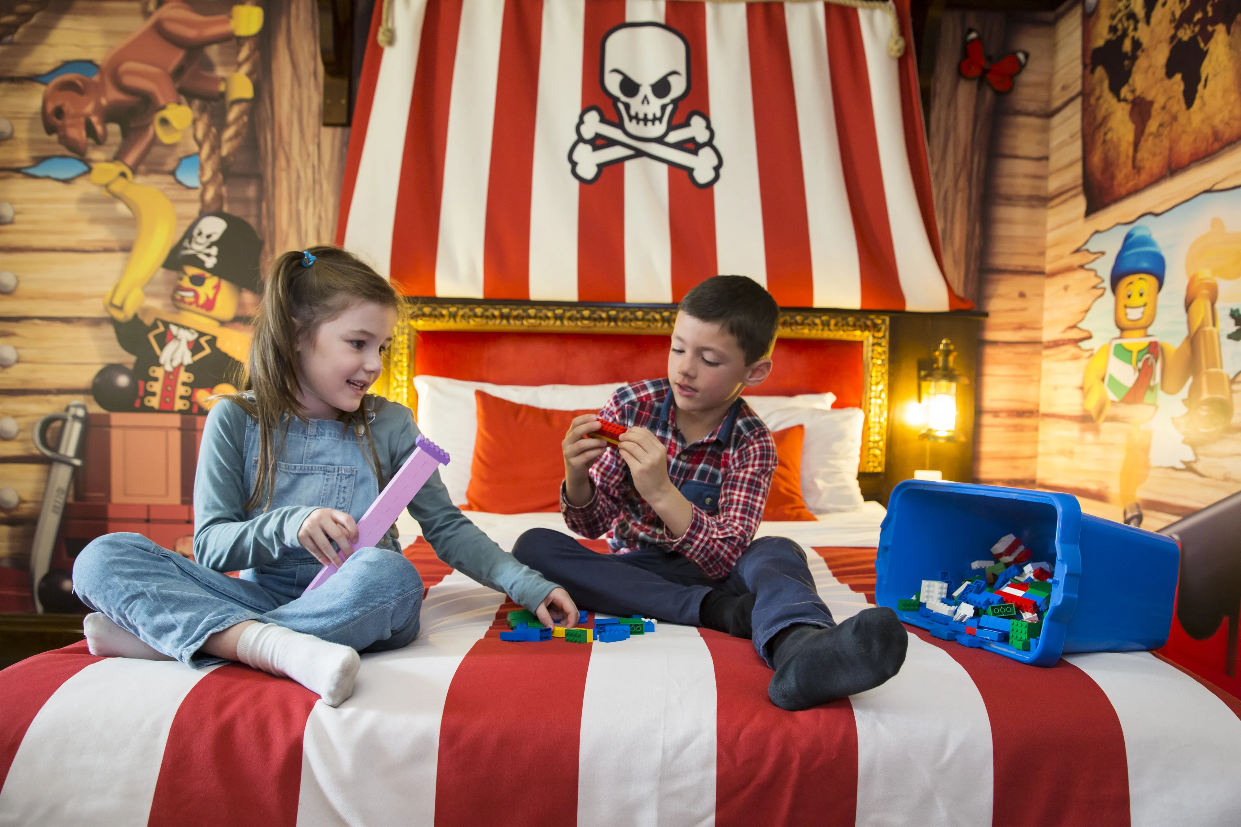 Kids playing with LEGO in a Pirate Room at the LEGOLAND Resort Hotel